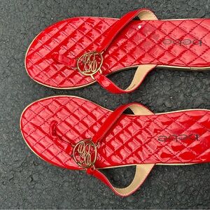Bebe Glossy Red Sandals with Gold Accents